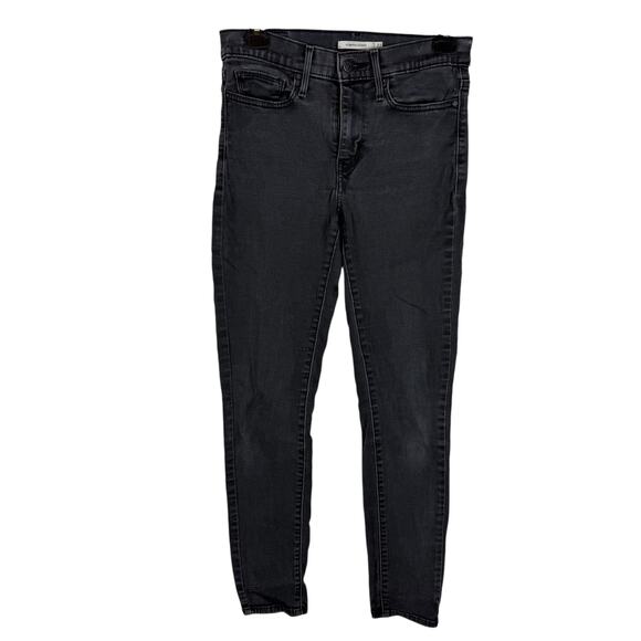 Levi's Jeans Women's 27 Black Denim Stretch Mid-Rise Slimming Skinny Leg Zip Fly - Picture 1 of 16